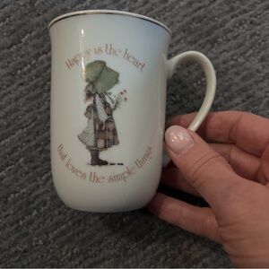 Holly Hobbie White Ceramic Mug- Happy Is the Heart